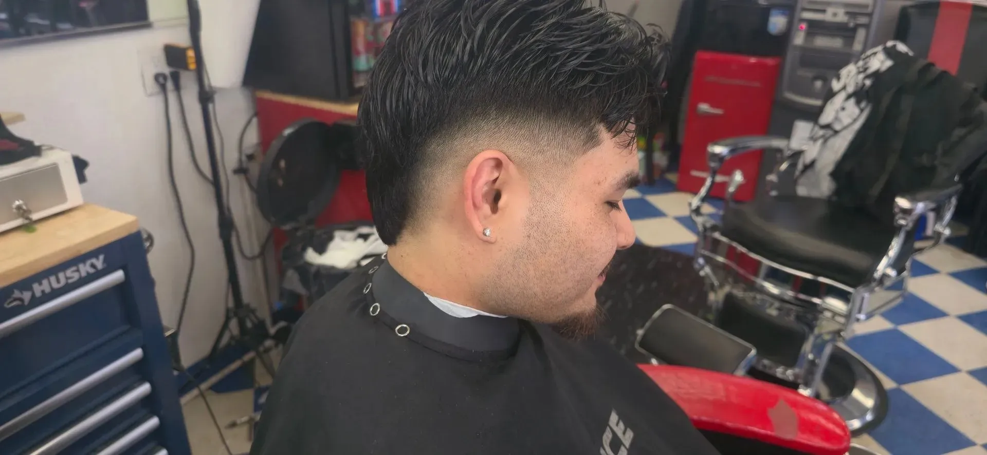 A fresh burst fade in the chair at Jeremy's Barber Shop