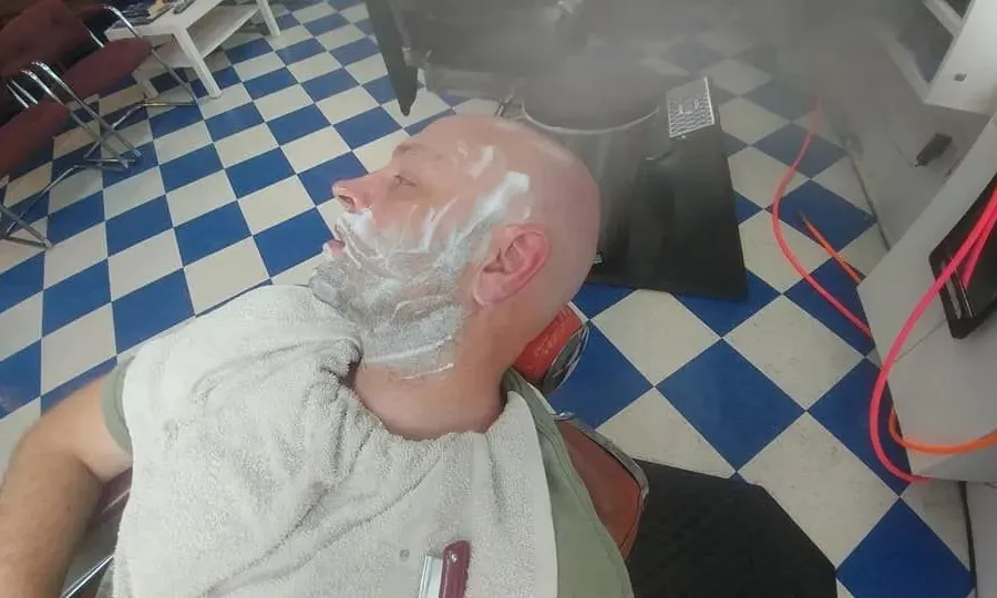 A hot towel straight razor shave