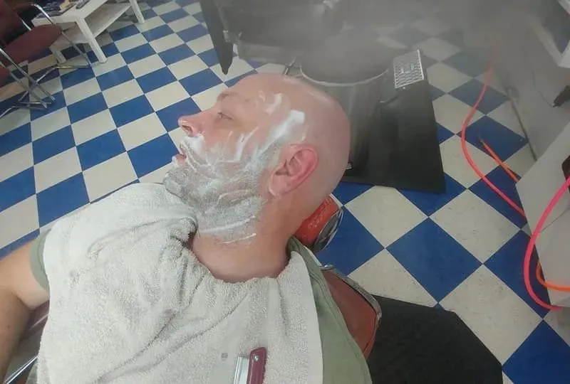 A hot towel straight razor shave